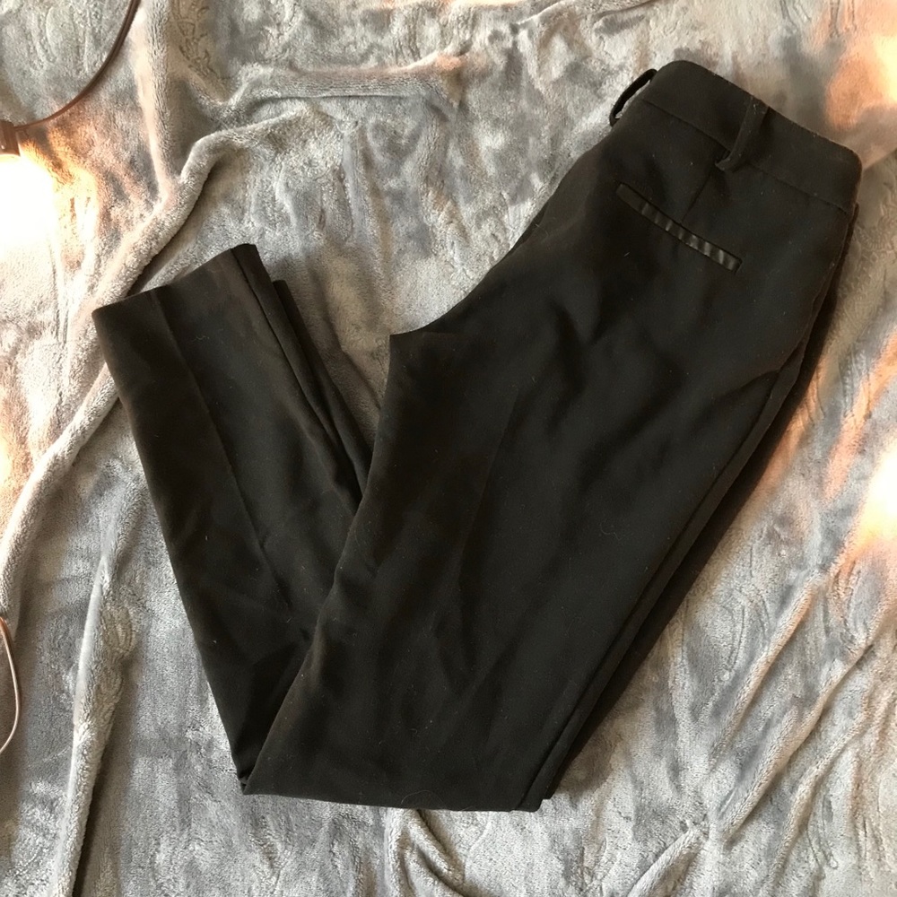 Ankle slacks with leather accents.